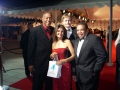 Abe Thompson, Rick Roberts, Neli Vasquez-Rowland and make-up artist to the stars Reggie Wells on the red carpet for the Grammy MusiCares gala.